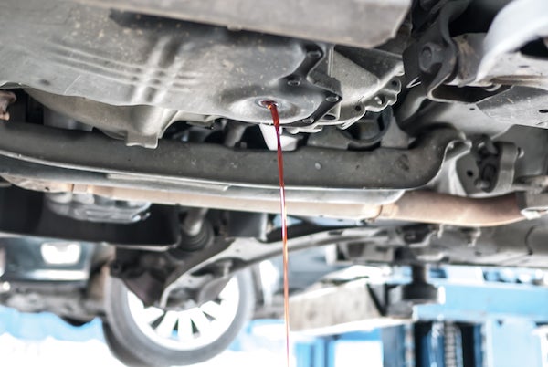 Draining old transmission fluid draining-transmission-fluid