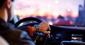 A man driving with his hands on the wheel Fort Lauderdale, FL | Gunther Kia