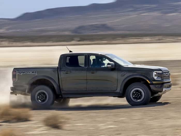 Gray Ford Ranger driving in the dirt