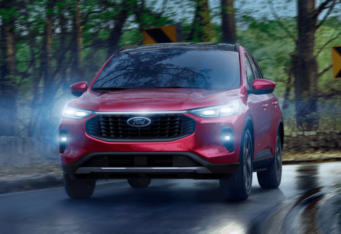 Red 2026 Ford Escape driving on the road