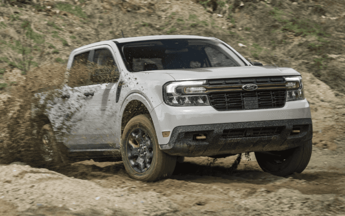 2025 Ford Maverick driving through the mud