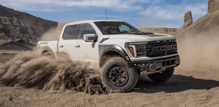 White Ford F-150 Raptor drifting