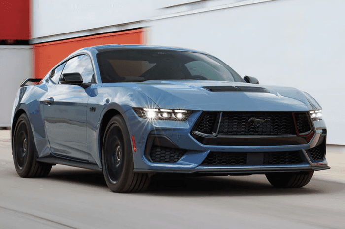 Blue 2025 Ford Mustang GT driving
