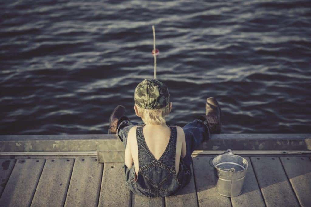 Little Kid fishing off the dock