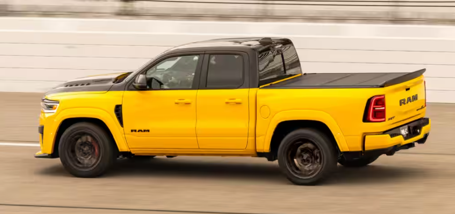 Yellow 2027 Ram 1500 Rumble Bee driving on raceway