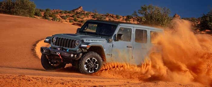 2025 Jeep Wrangler driving in dunes
