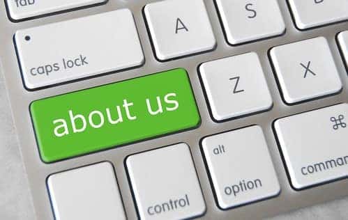 Keyboard with green about us key replacing shift key