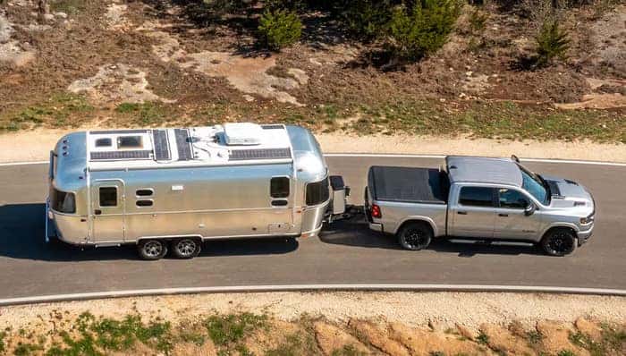 2025 Ram 1500 towing a trailer