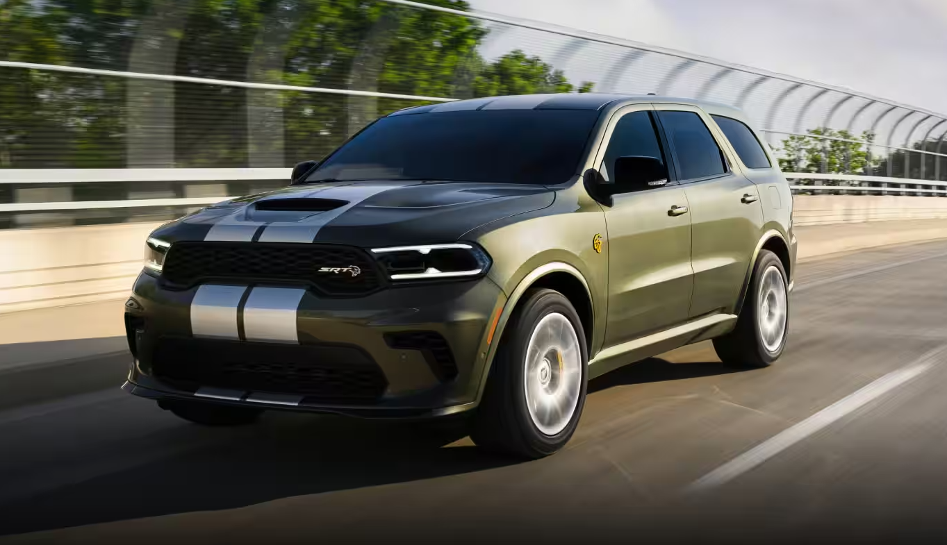 Green 2027 Dodge Durango driving on road