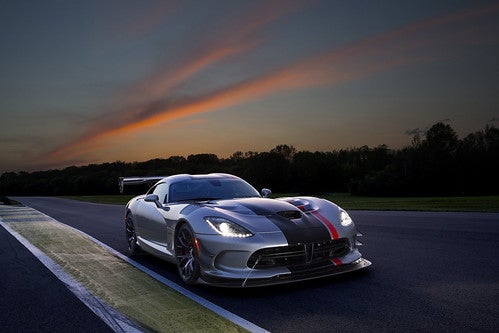 Dodge Viper driving at night.