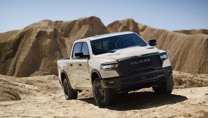White Ram 1500 drinving on the rocks