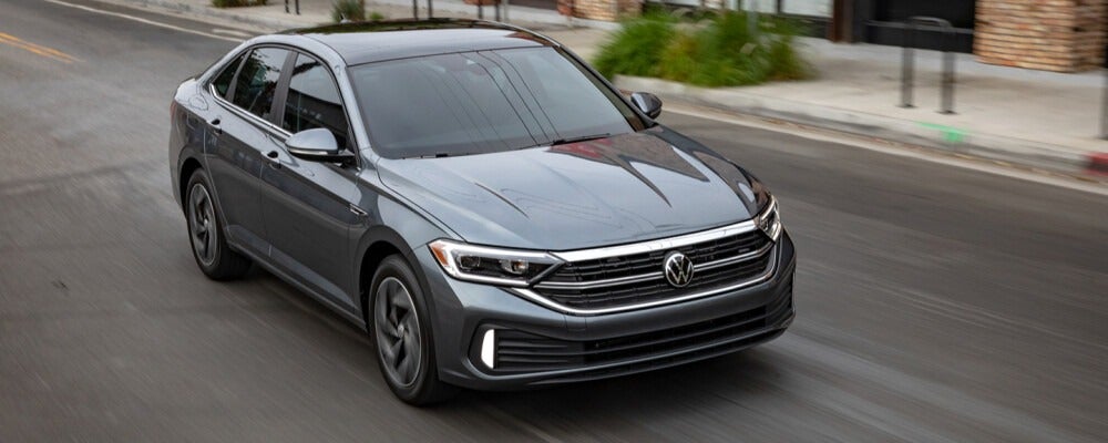 2022 Volkswagen Jetta driving downtown