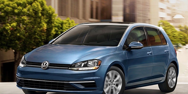 side view of a blue 2020 Volkswagen Golf 