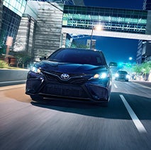 Model Features of the 2022 Toyota Camry at Bennett Toyota of Lebanon | Camry driving fast at night