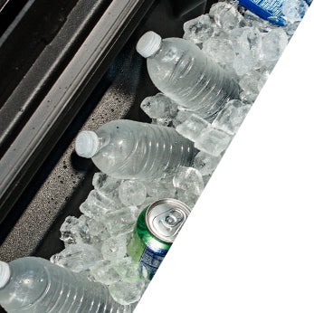 How to prepare your Toyota for the winter season in Lebanon, PA at Bennett Toyota of Lebanon | Close-up of Tacoma's cooler filled with water and other beverages