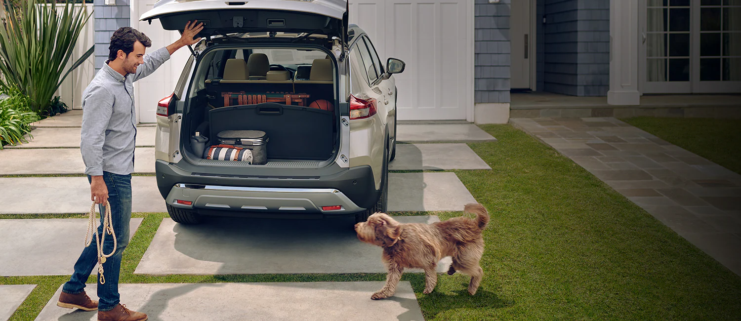 Nissan Rogue man with dog