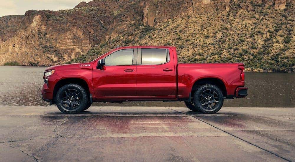 A red 2024 Chevy Silverado 1500 Z71 parked at a side angle.