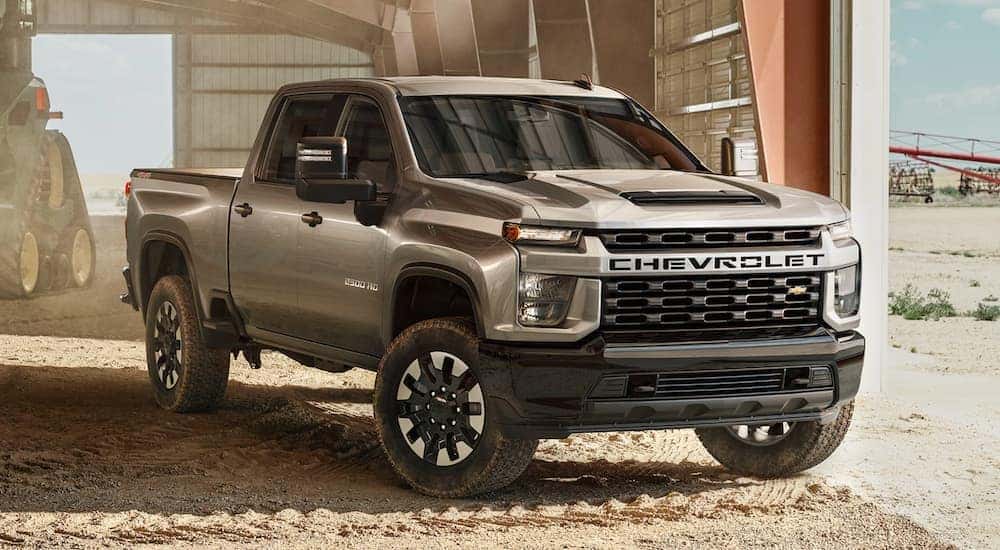 A grey 2020 Chevy Silverado 2500 is parked in a barn in Lexington, KY.