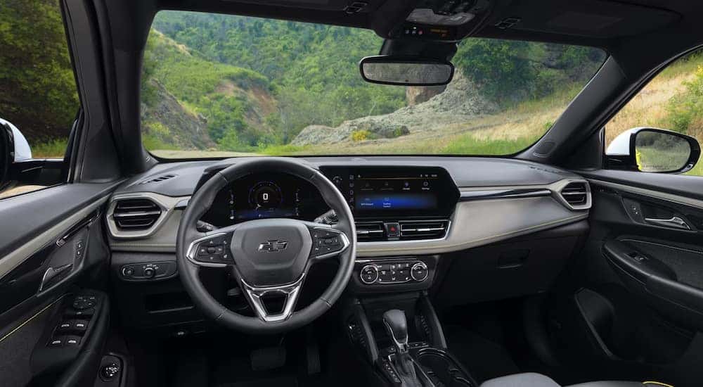 The interior of a 2024 Chevy Trailblazer for sale at a Chevy dealer near Huntington.