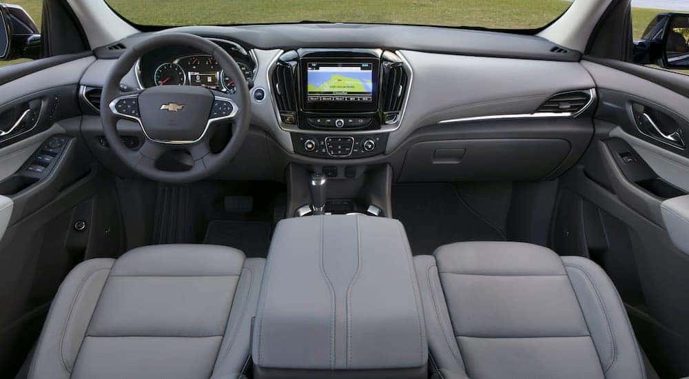 The grey interior is shown on a 2018 used Chevy Traverse.