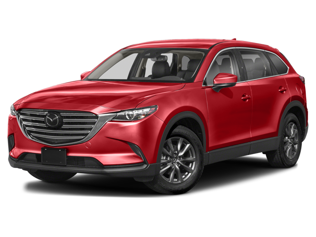 Mazda CX-9 in bright red parked on a city street, showcasing its sleek design and modern features.