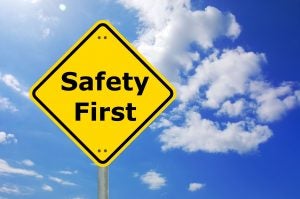A road sign that says safety first.