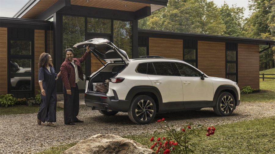 Family loading the 2026 Mazda CX-50 Hybrid
