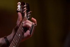 hand playing guitar