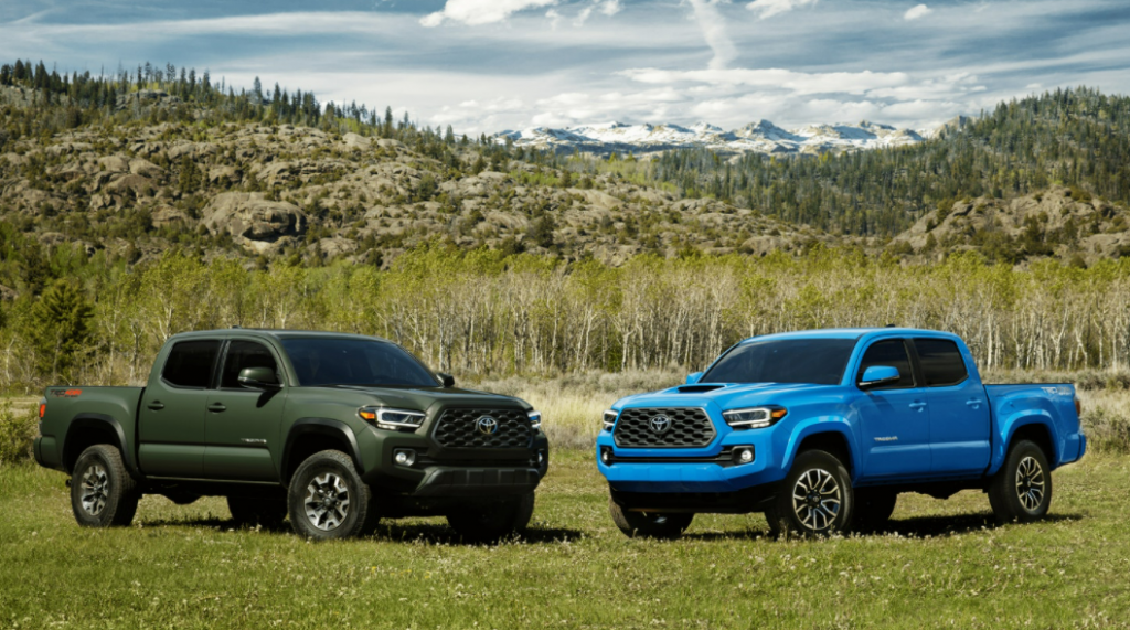 army green and blue Toyota Tacomas