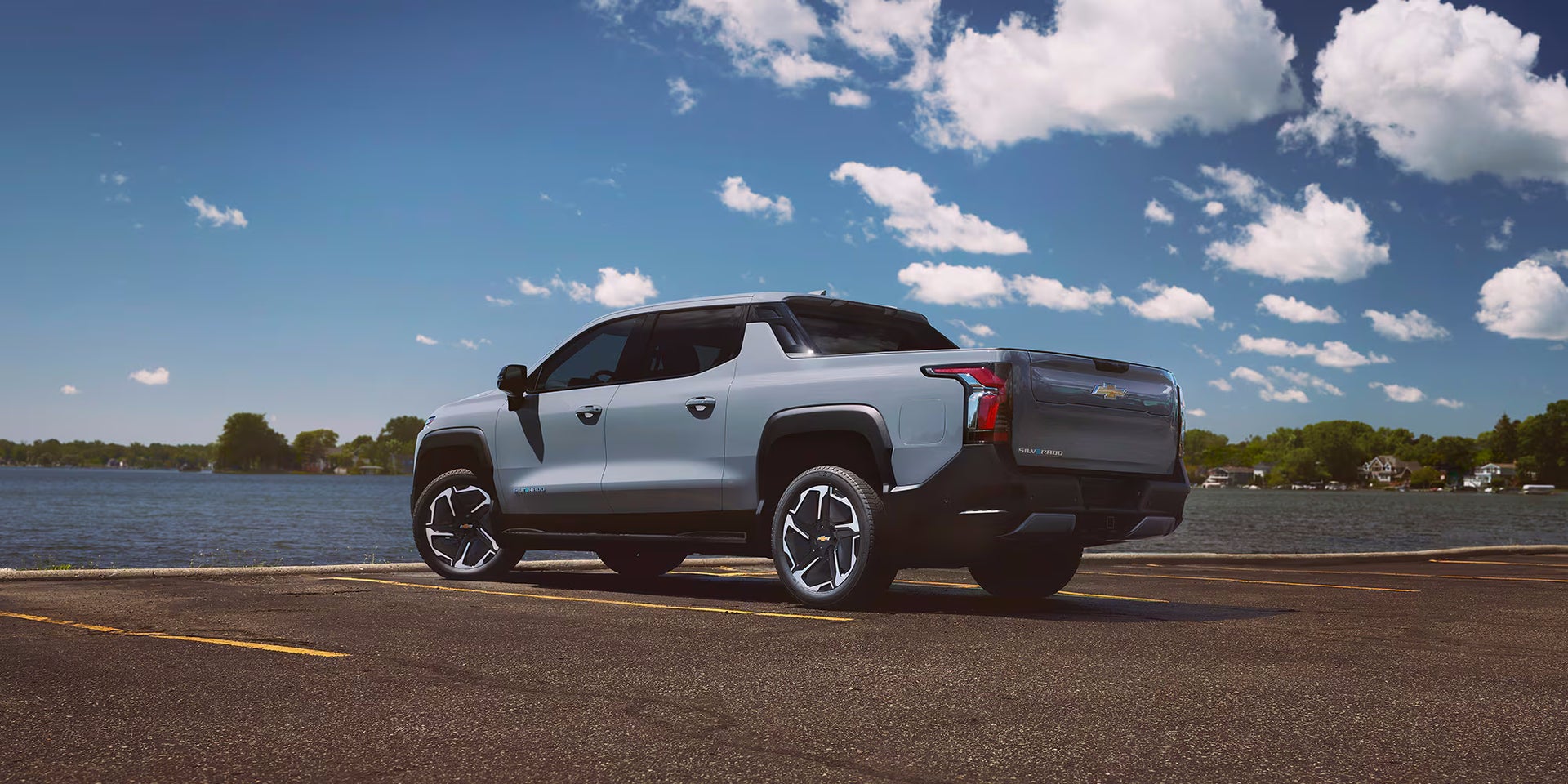 2024 Chevy Silverado EV at a riverside park