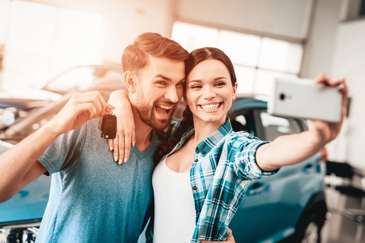 A happy couple that financed here at Savage 61 Chrysler Jeep Dodge RAM located in Reading, PA