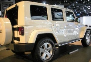 White electric Jeep Wrangler. 