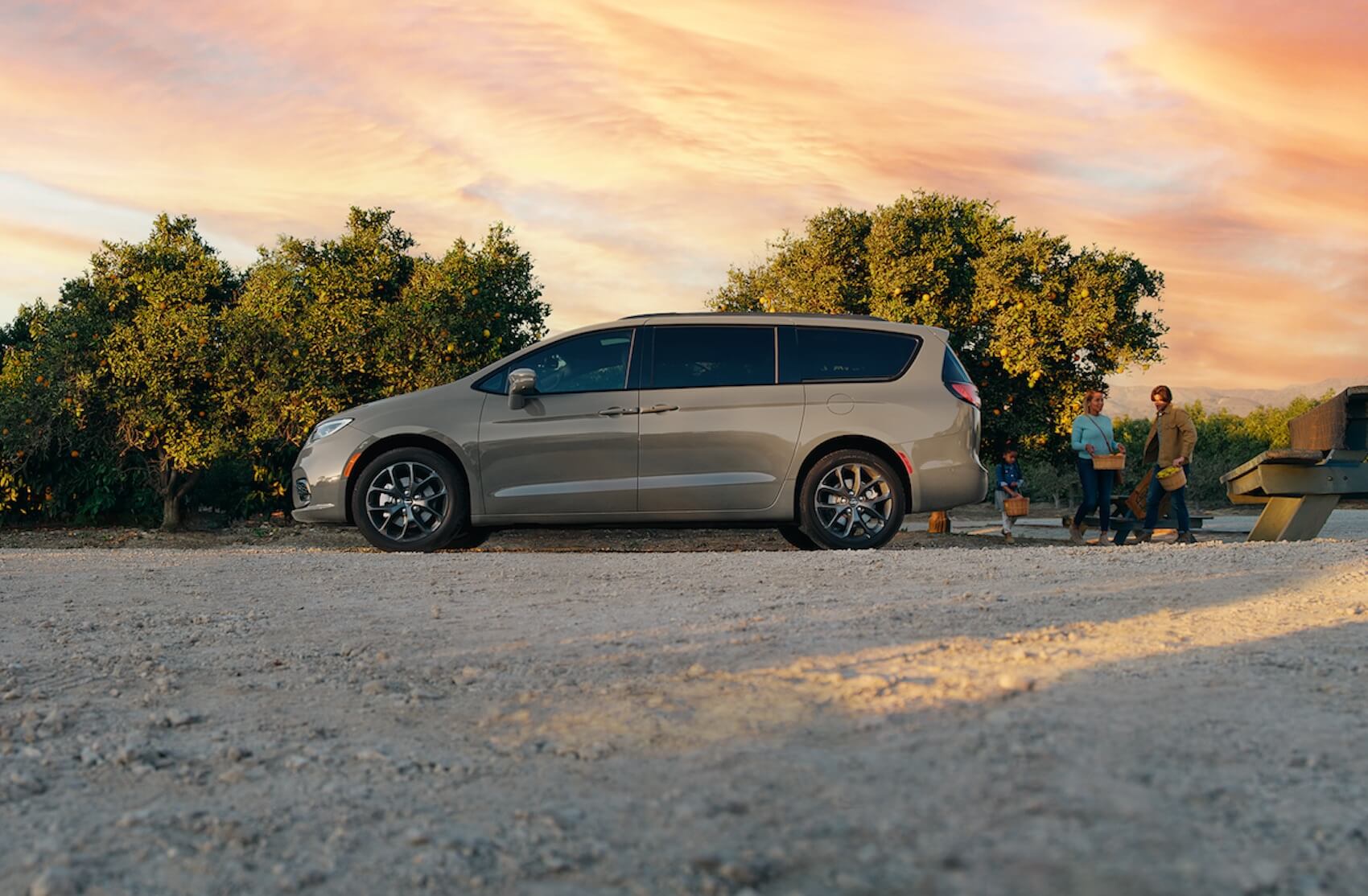 Service technician inspecting Chrysler Pacifica