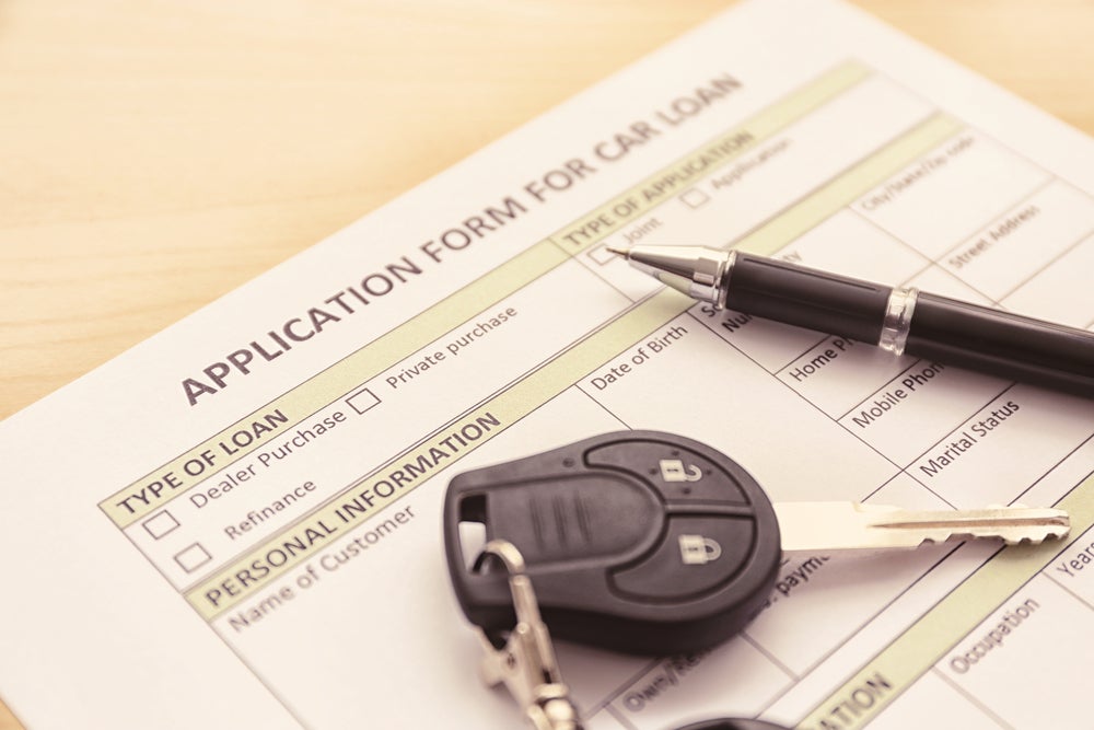 Application,Form,For,Car,Loan,,Pen,And,Key,On,Wooden