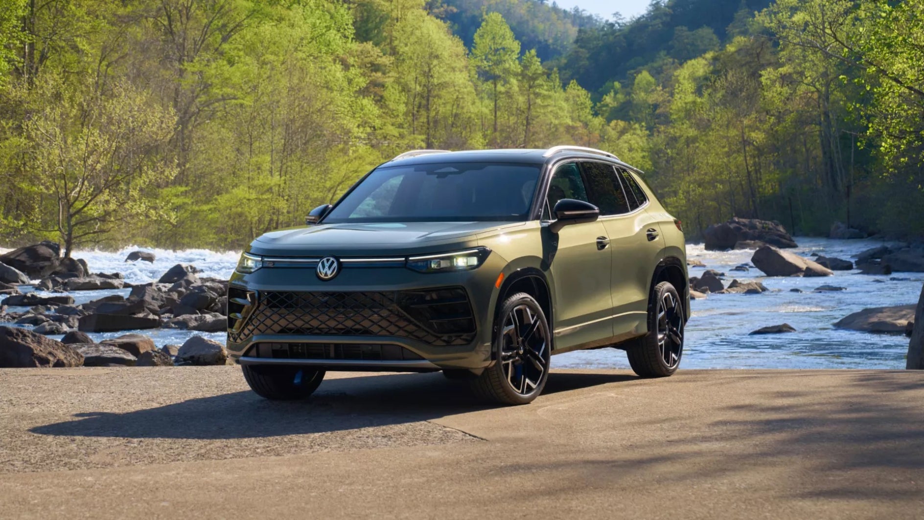 2026 VW Tiguan parked beside a river