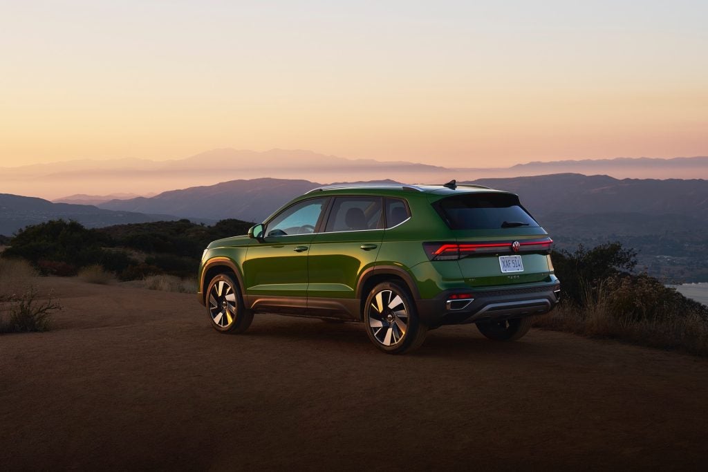 A Shiny Volkswagen Taos, Looking Out At The Enchanting Landscapes