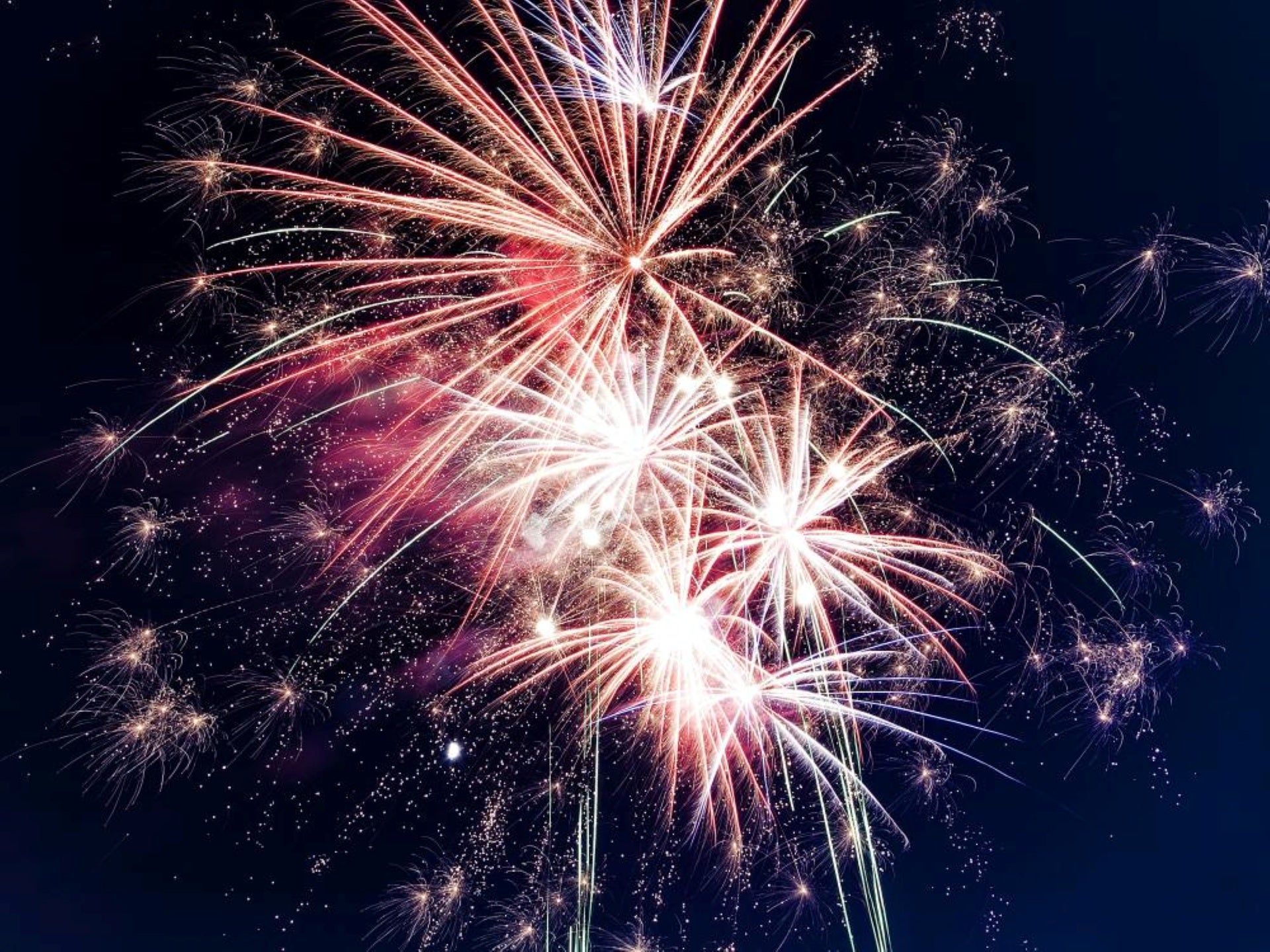 A Bright And Beatiful Fireworks Display In The Night Sky