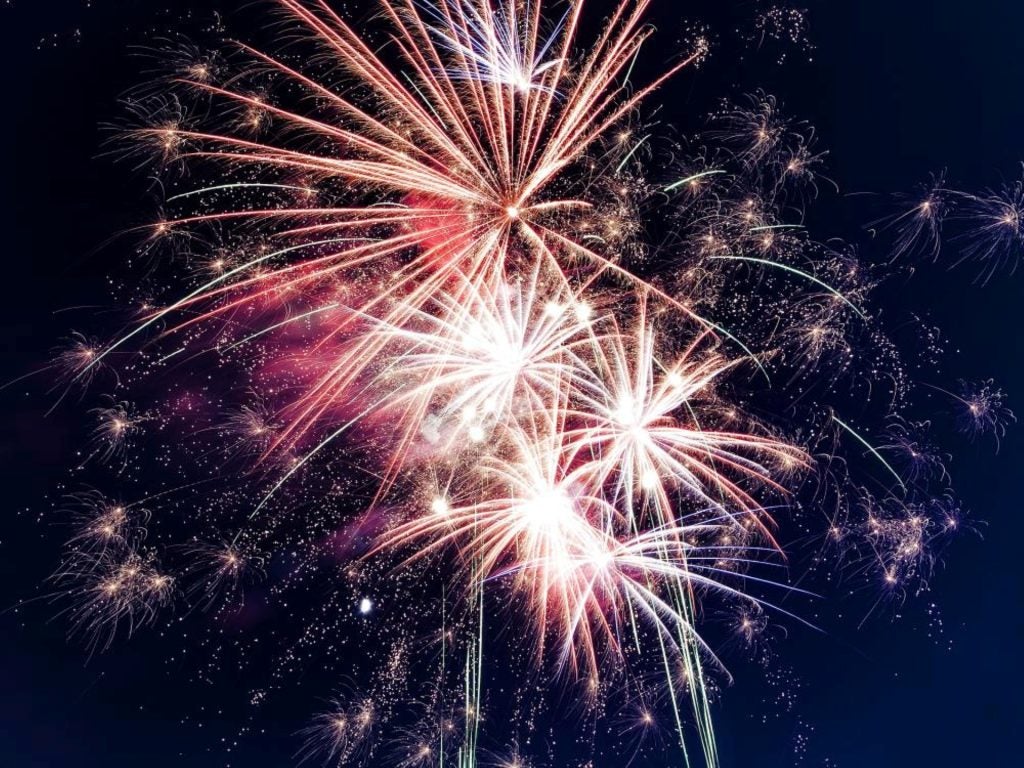 A Bright And Beatiful Fireworks Display In The Night Sky