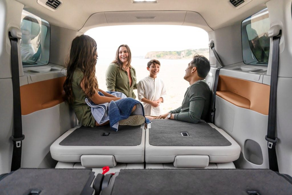 A Happy Family In The Spacious Cargo Area Of The Stellar ID.Buzz