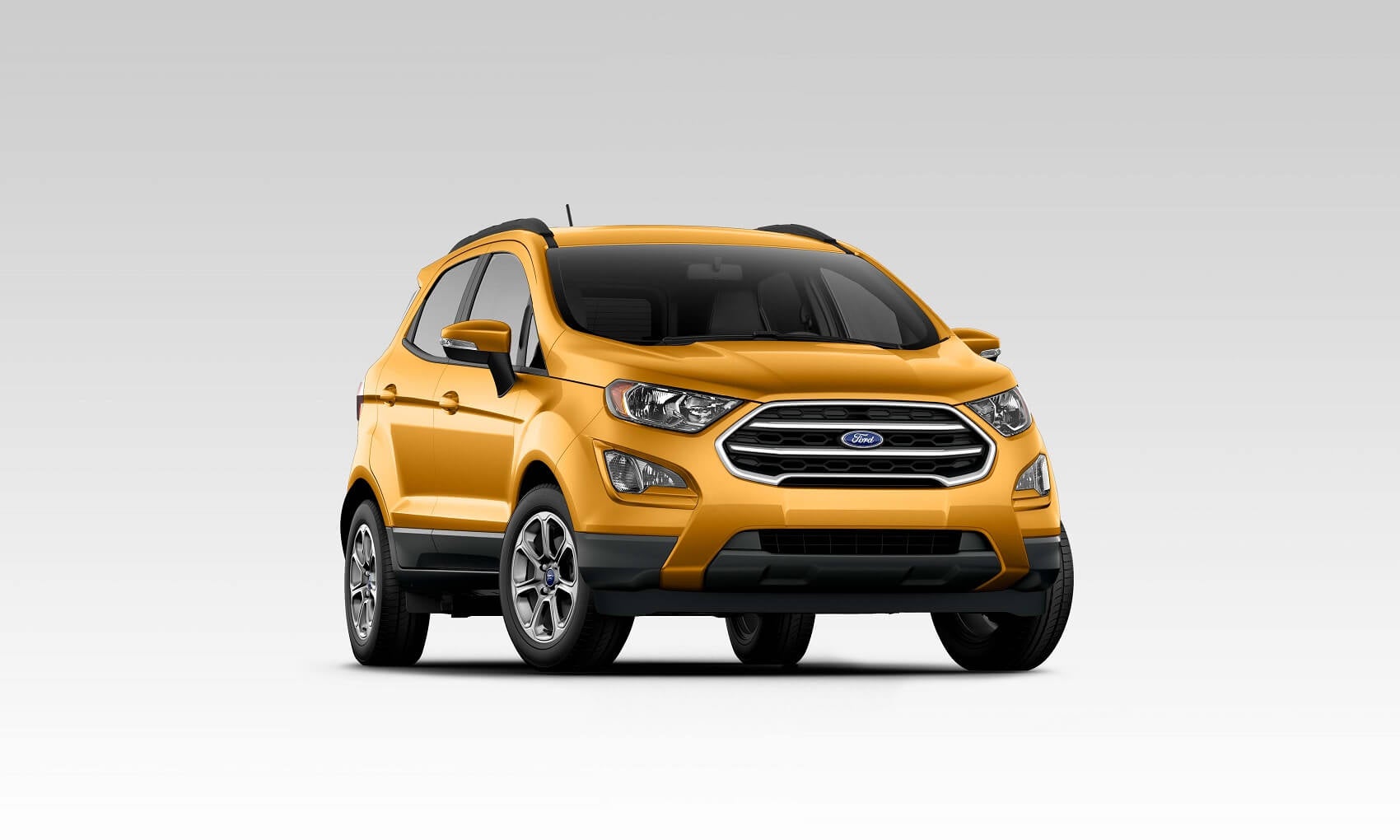 New yellow Ford EcoSport against a white background