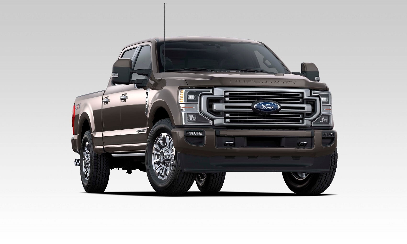New Brown 2021 Ford Super Duty F-250 against a grey and white gradient background.