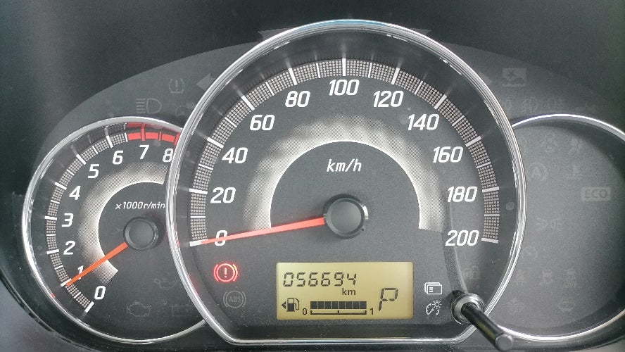 A vehicle's odometer, showing it has 56,694 miles on it.