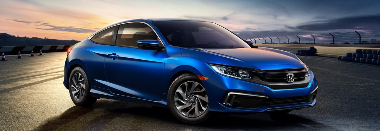 Blue 2019 Honda Civic Si parked on race track