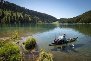 A man fishing on a lake in Great Falls, MT | Taylor's Auto Max