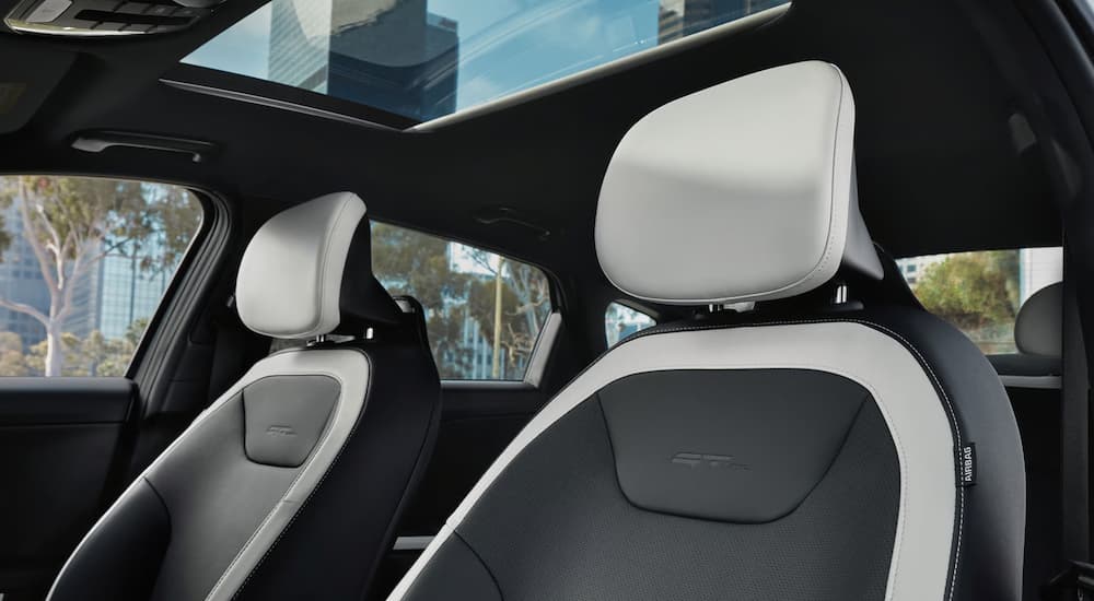 Black and gray seating inside a 2026 Kia K4