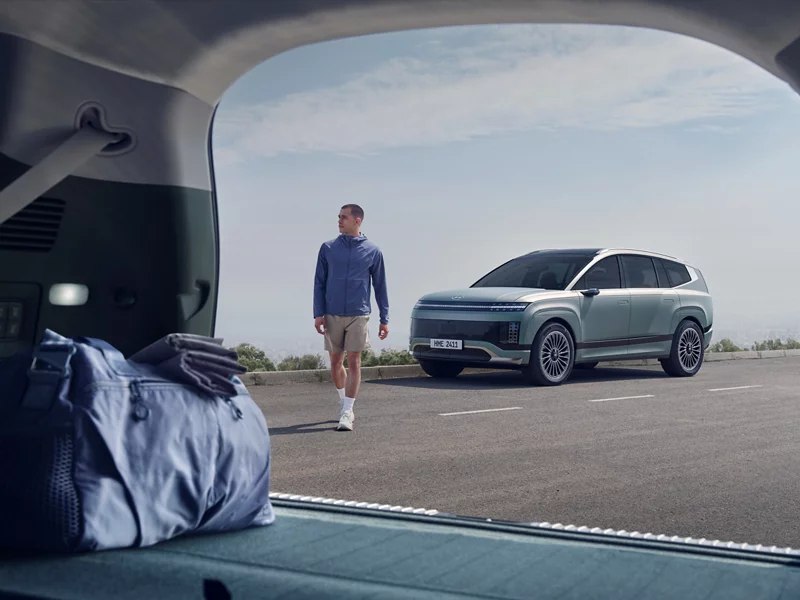 Photo of person walking away from IONIQ 9