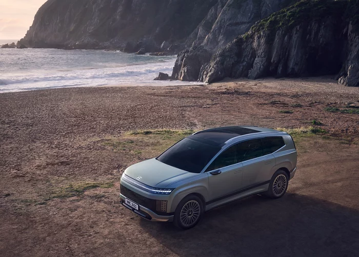 Three quarter view of IONIQ 9 in grass