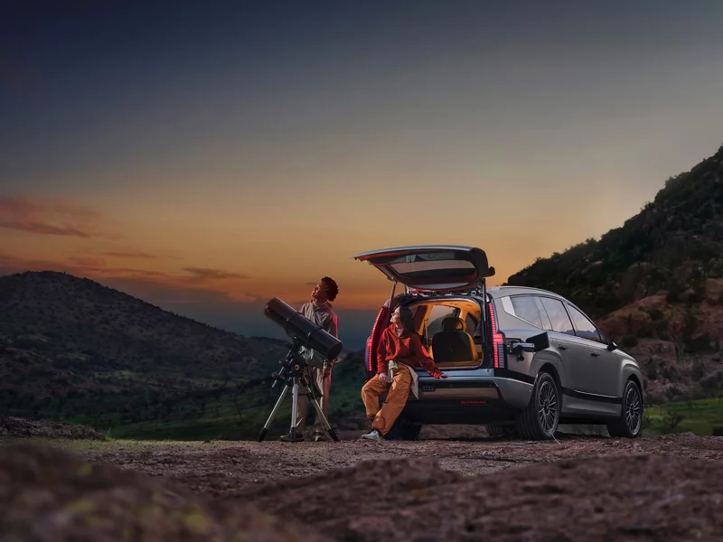 Family enjoying the outdoors with their IONIQ 9