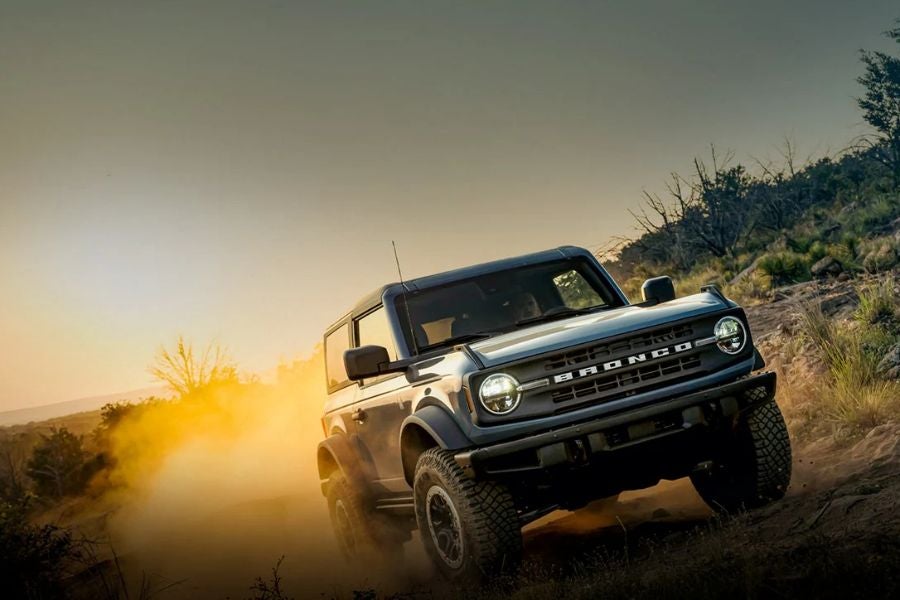 New Ford Bronco on dusty road