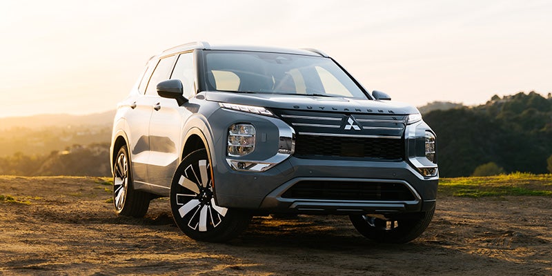 2026 Grey Mitsubishi Outlander stand still on road